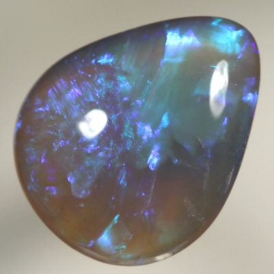 SOLID BLACK CRYSTAL OPAL Loaded with bright colours